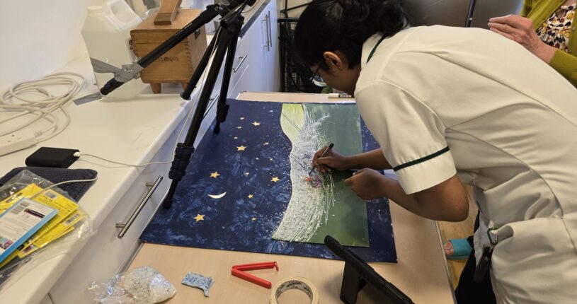 Staff member doing art therapy at Franklyn Hospital in Exeter