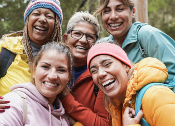 Women having fun taking a selfie during trekking day