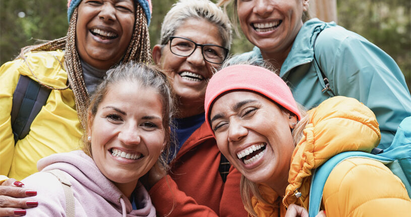 Women having fun taking a selfie during trekking day