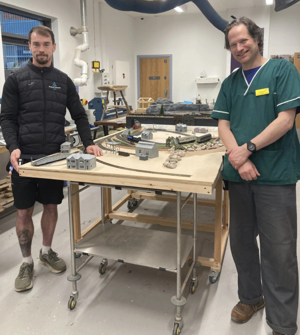 Picture of staff in the workshop at Langdon Hospital during patient and family day