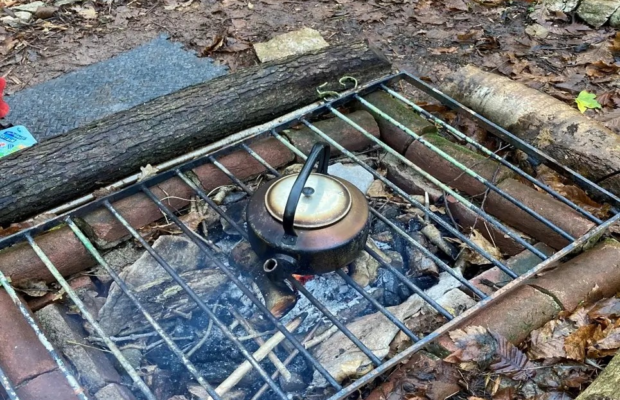 Kettle over a fire at forest school