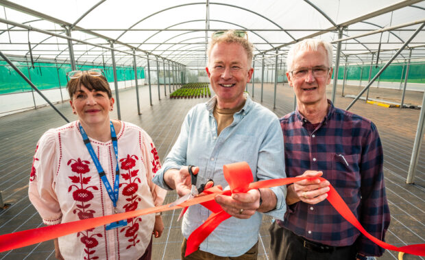 Toby Buckland and staff at New Leaf opening the new multispan polytunnel and New Leaf in Exminster.