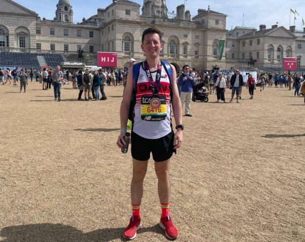 Dan with his medal at the end of the London Marathon.
