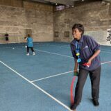 Staff member taking part in on of the games at the event.